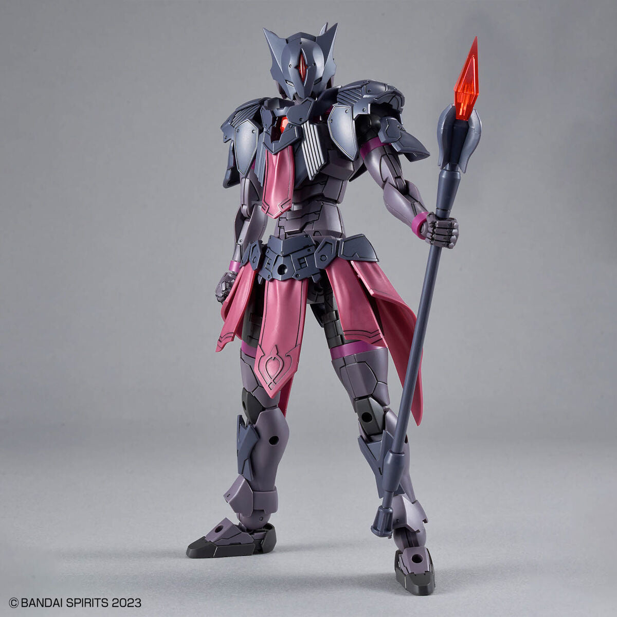 30MF Rosan Priest figure with pink and gray design holding a spear on a gray background