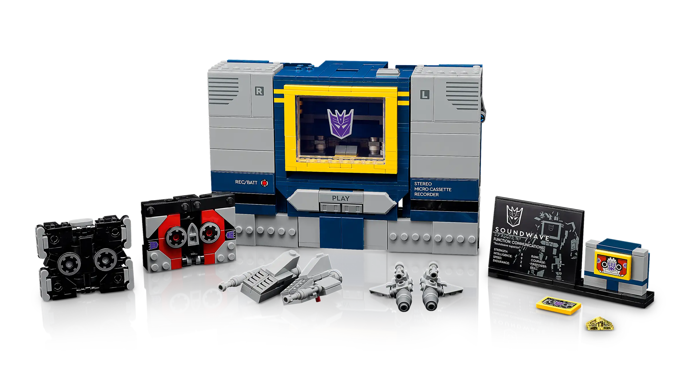 LEGO 10358 Transformers: Soundwave set with various pieces including a console and figures on a white background