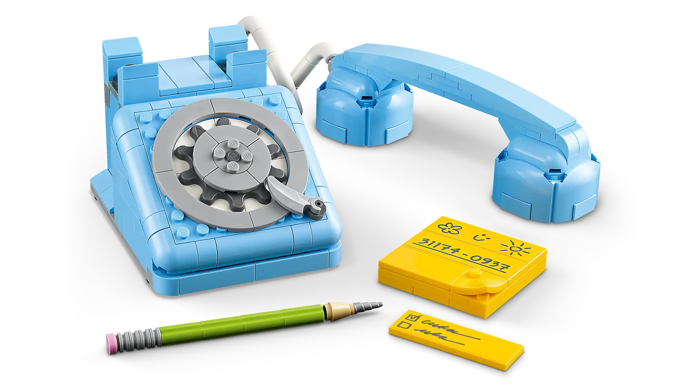 LEGO 31174 Retro Telephone set with a pen and paper on a white background