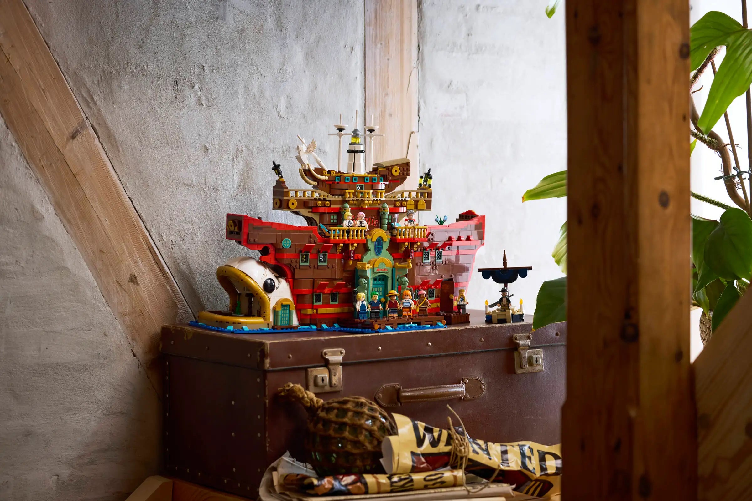 LEGO 75640 The Baratie Floating Restaurant on a wooden chest with a rustic background