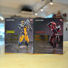 Two action figure boxes, one for Wolverine and one for Deadpool, on a blurred indoor background - 1/9 Deadpool & Wolverine Model Kit Combo Set