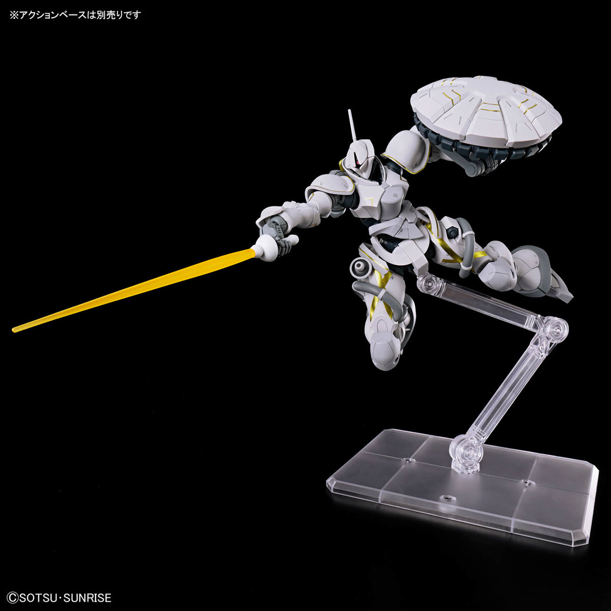 HG Xavier’s Gyan Hakuji-Packs with a yellow weapon on a clear stand against a black background