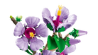 LEGO 10372 Hibiscus set with purple flowers and green leaves on a white background