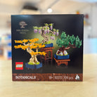 LEGO 10373 Mini Bonsai Trees set packaging on a blurred background