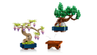 LEGO bonsai tree set with a small table and water fountain on a white background