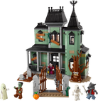 LEGO 31167 Haunted Mansion set with characters on a white background