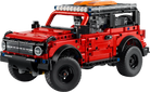 Red toy truck model resembling a Ford Bronco on a white background - LEGO 42213 Ford Bronco SUV