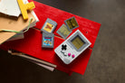 LEGO 72046 Game Boy with games on a red surface