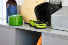 LEGO 77237 Dodge Challenger SRT Hellcat car on a shelf with a melon box and other items in the background