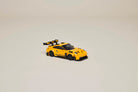 LEGO 77239 Porsche 911 GT3 RS Yellow toy car on a beige background